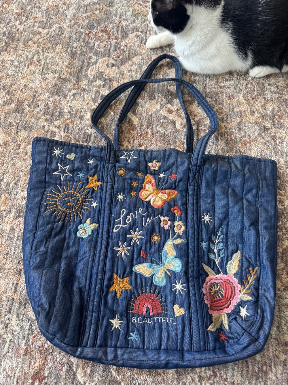 Johnny was embroidered denim bag